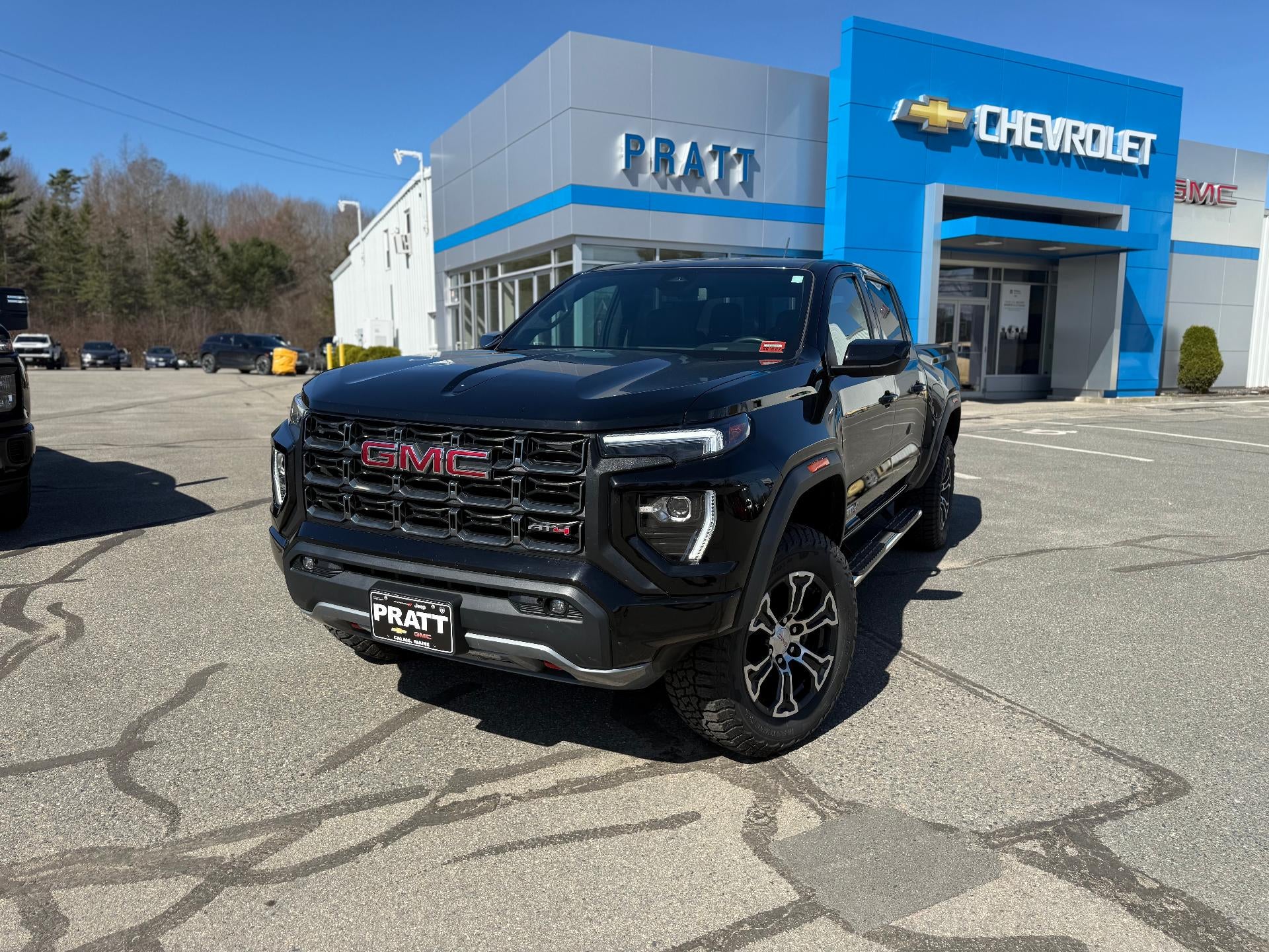 2023 GMC Canyon 4WD Crew Cab Short Box AT4 in Onyx Black — front three-quarter view